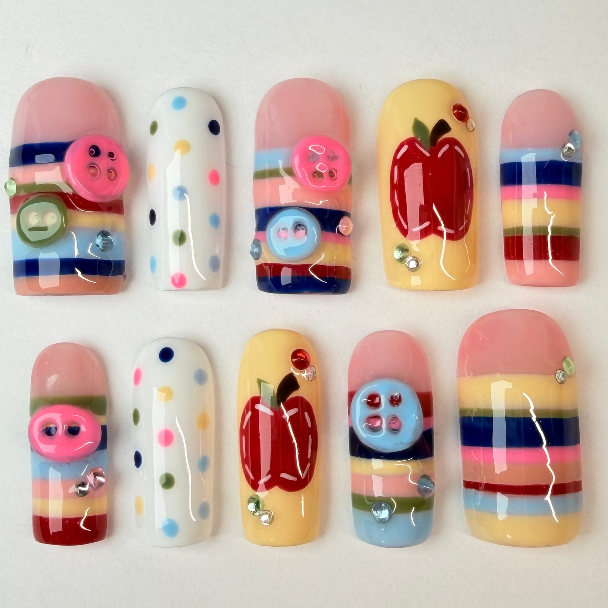 Cute, stitched apples, 3D buttons, party polkadots and small rhinestones